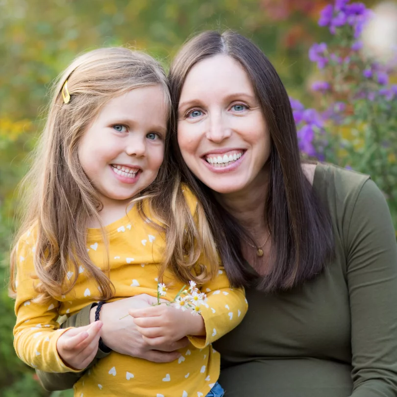 Sam Ellsworth with her arm around her daughter